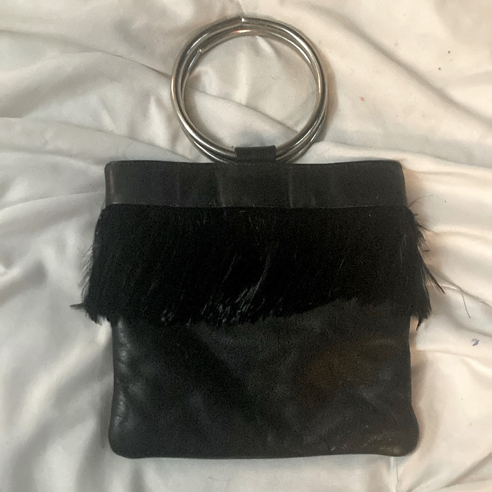 Designer Onyx Noir : small Soft leather bangle bag some soft feather around .
